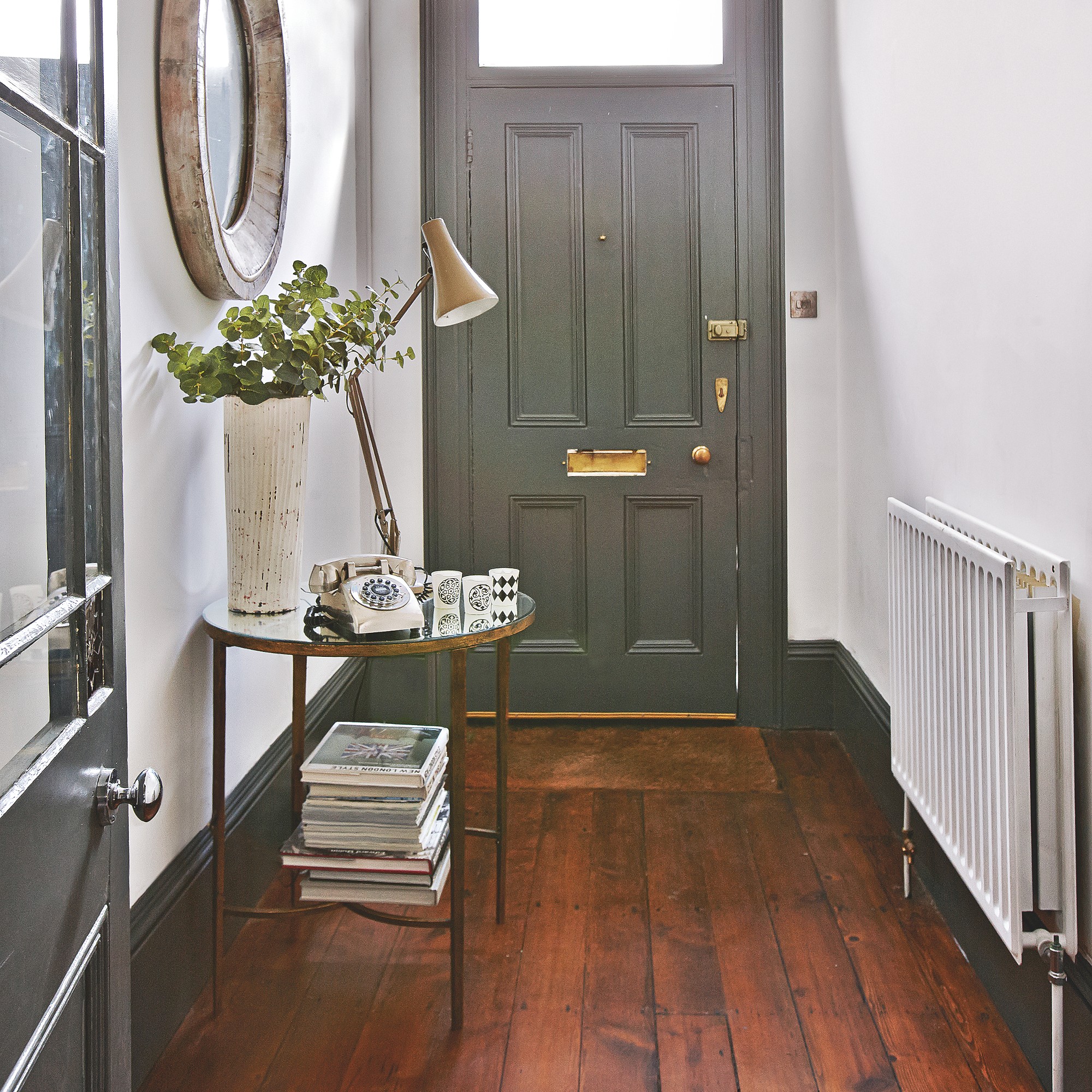 Neutral hallway with crisp white woodwork.