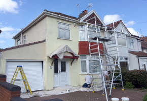 Exterior house painting completed.